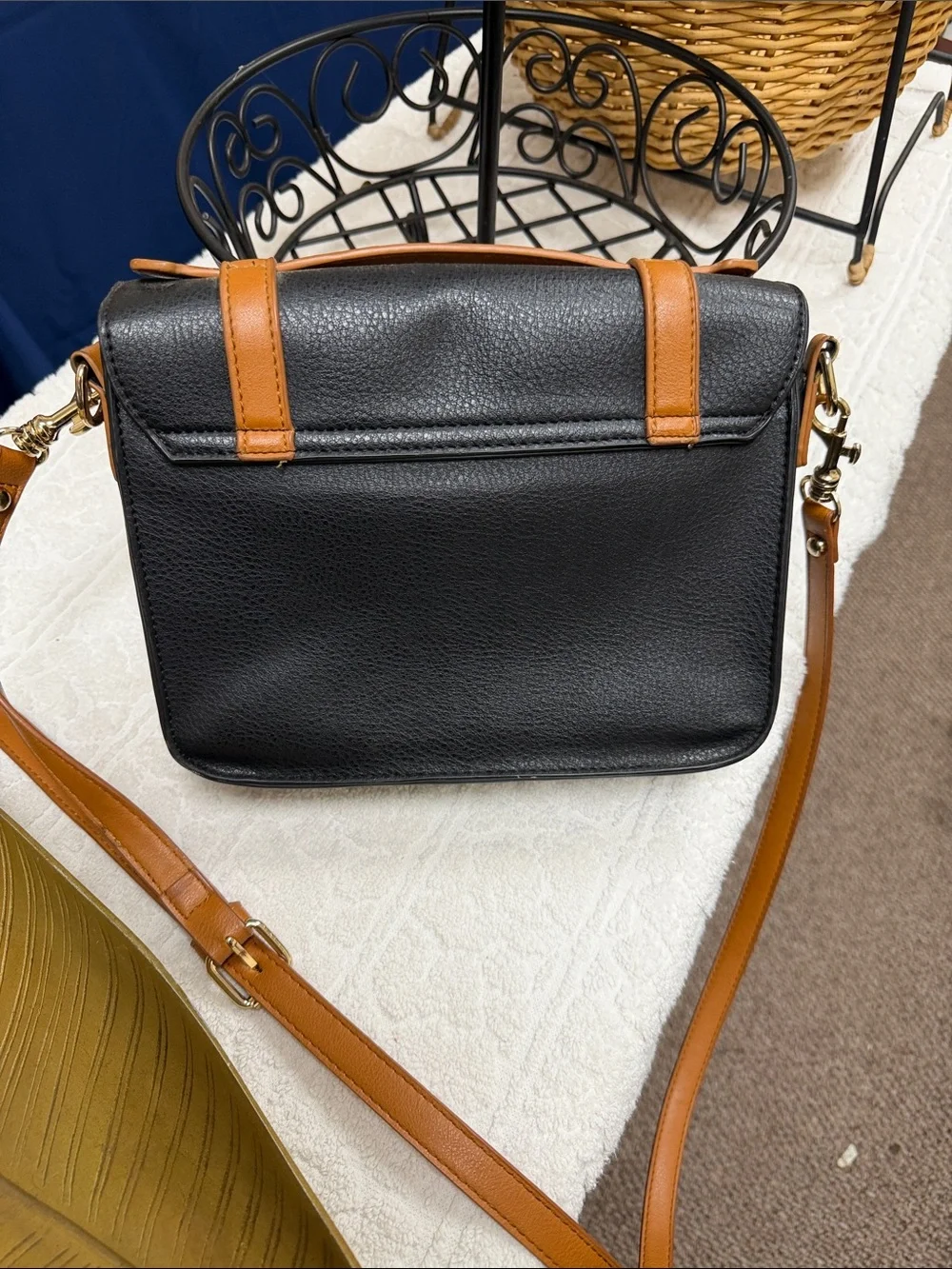 Woman’s Black and Tan Leather Crossbody Bag